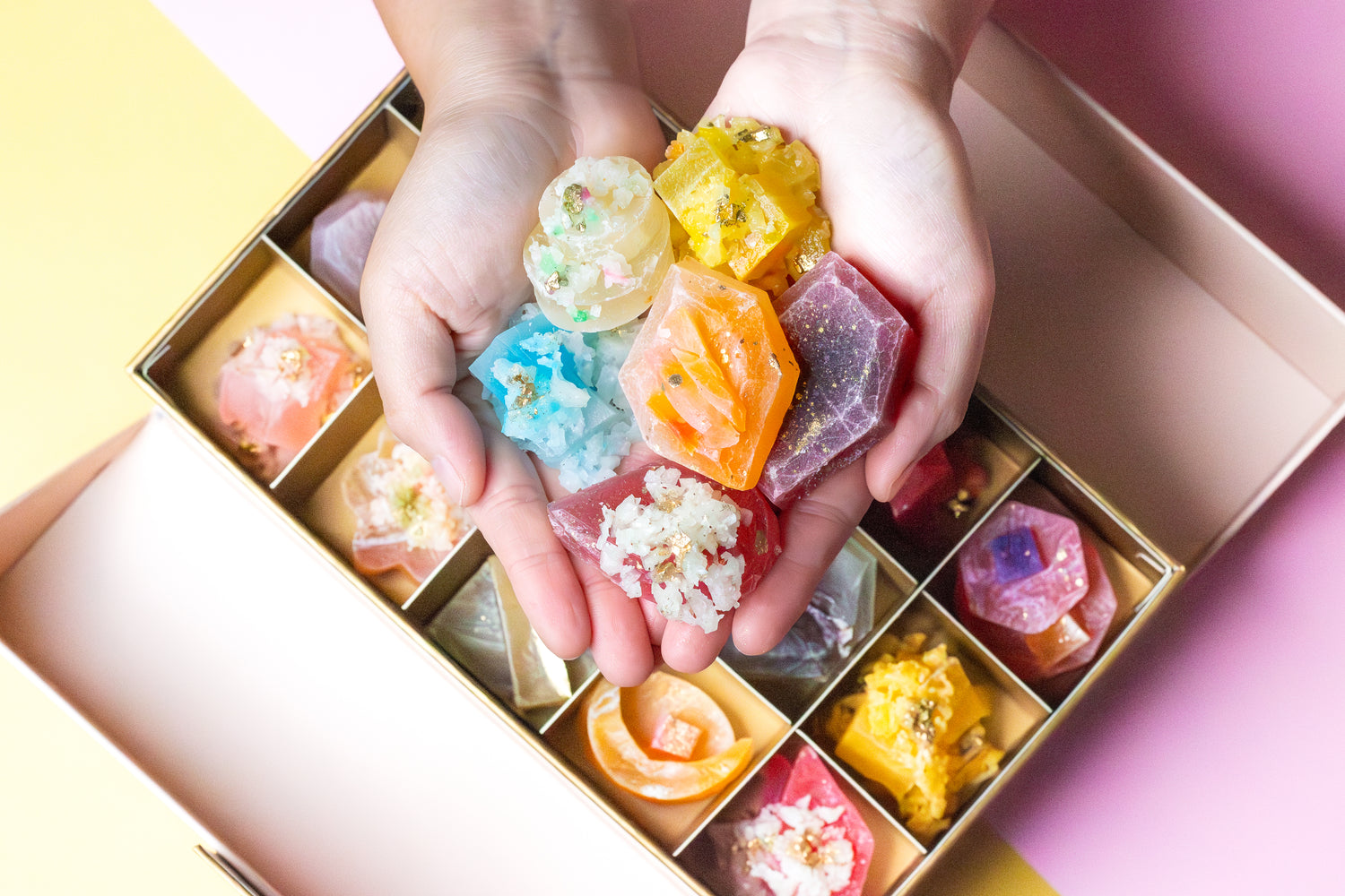 silky gem ambassador holding a mix of silky gem crystal candies