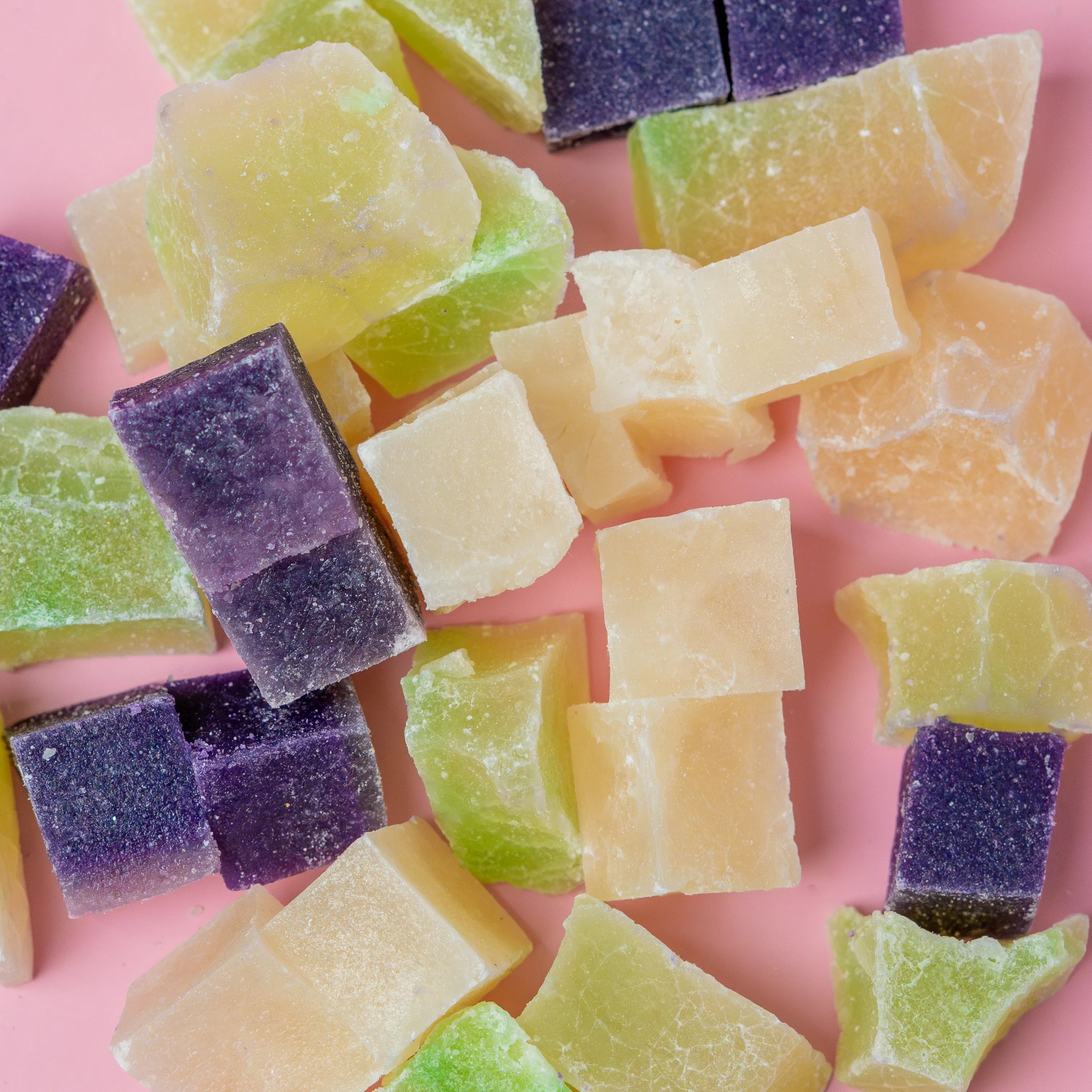 Coconut snack bites pouch with purple, white, and green crystal candy.