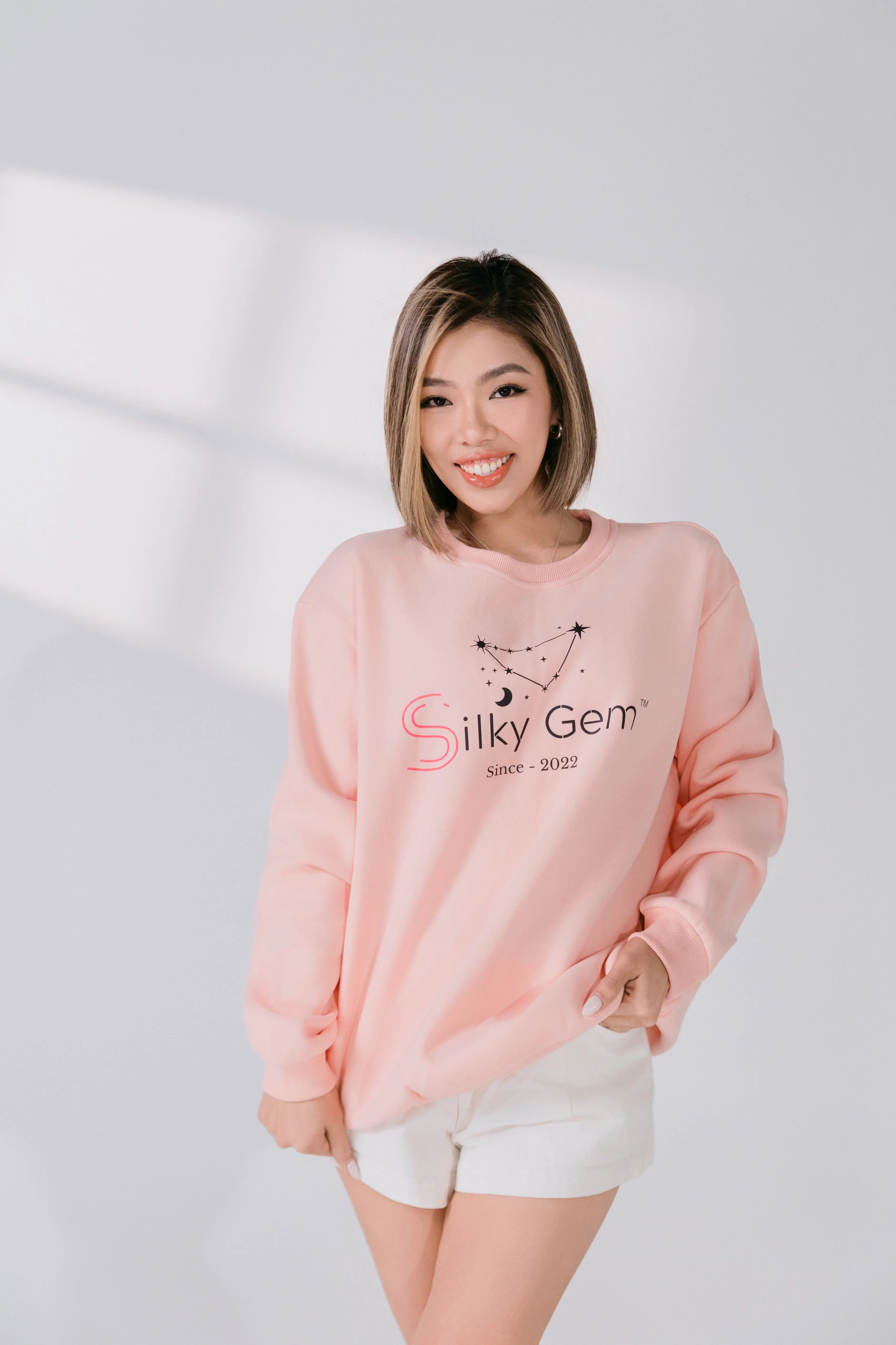 Close-up of Silky Gem logo and “Since 2022” detail on front.