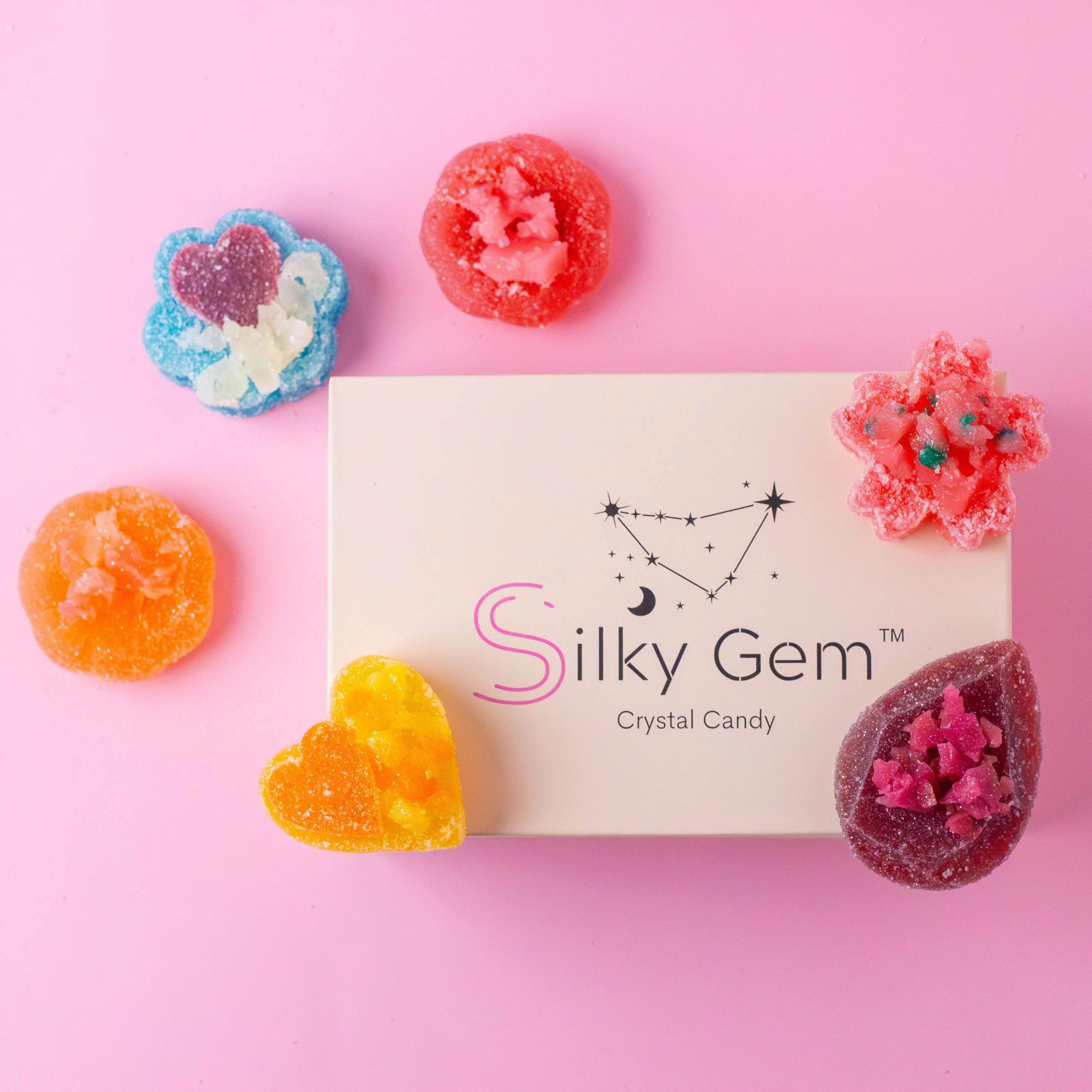Six pieces of crystal candy with a Silky Gem box.