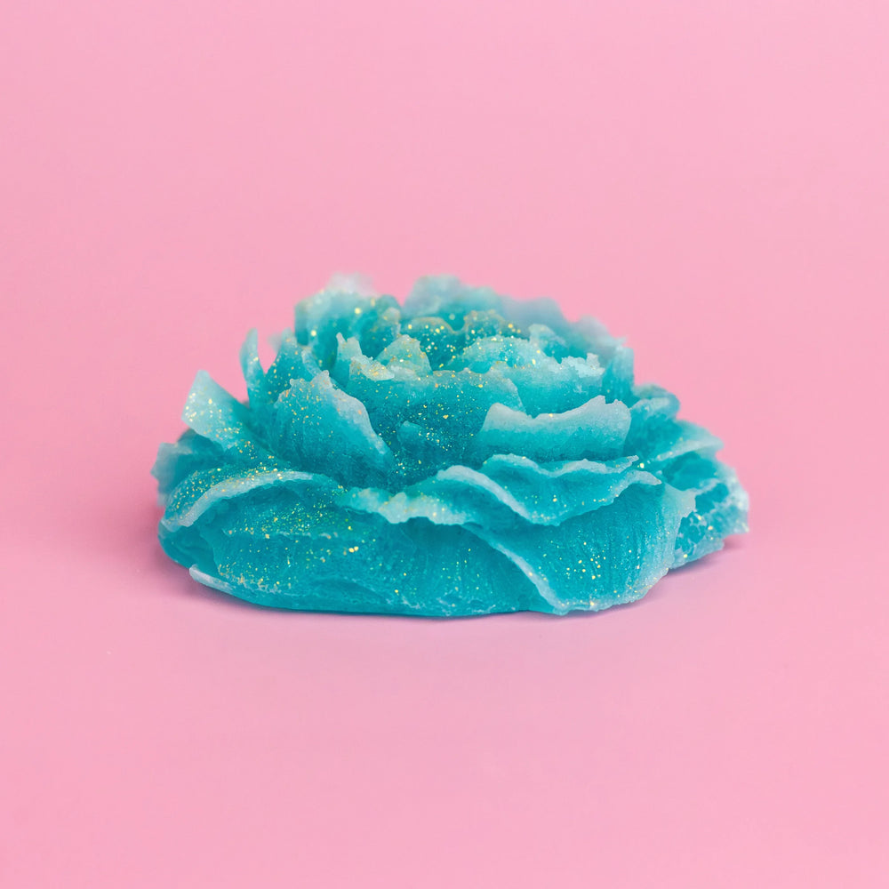 Peony Dream flower-shaped crystal candy on a pink background
