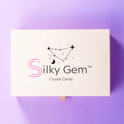 Silky Gem Crystal Candy packaging on a purple background