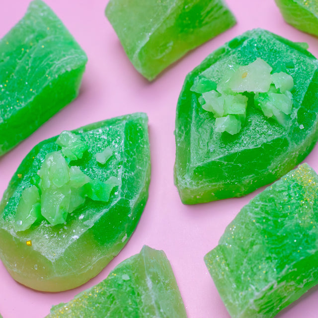 Green Coconut Pandan Jade crystal candies on a pink background