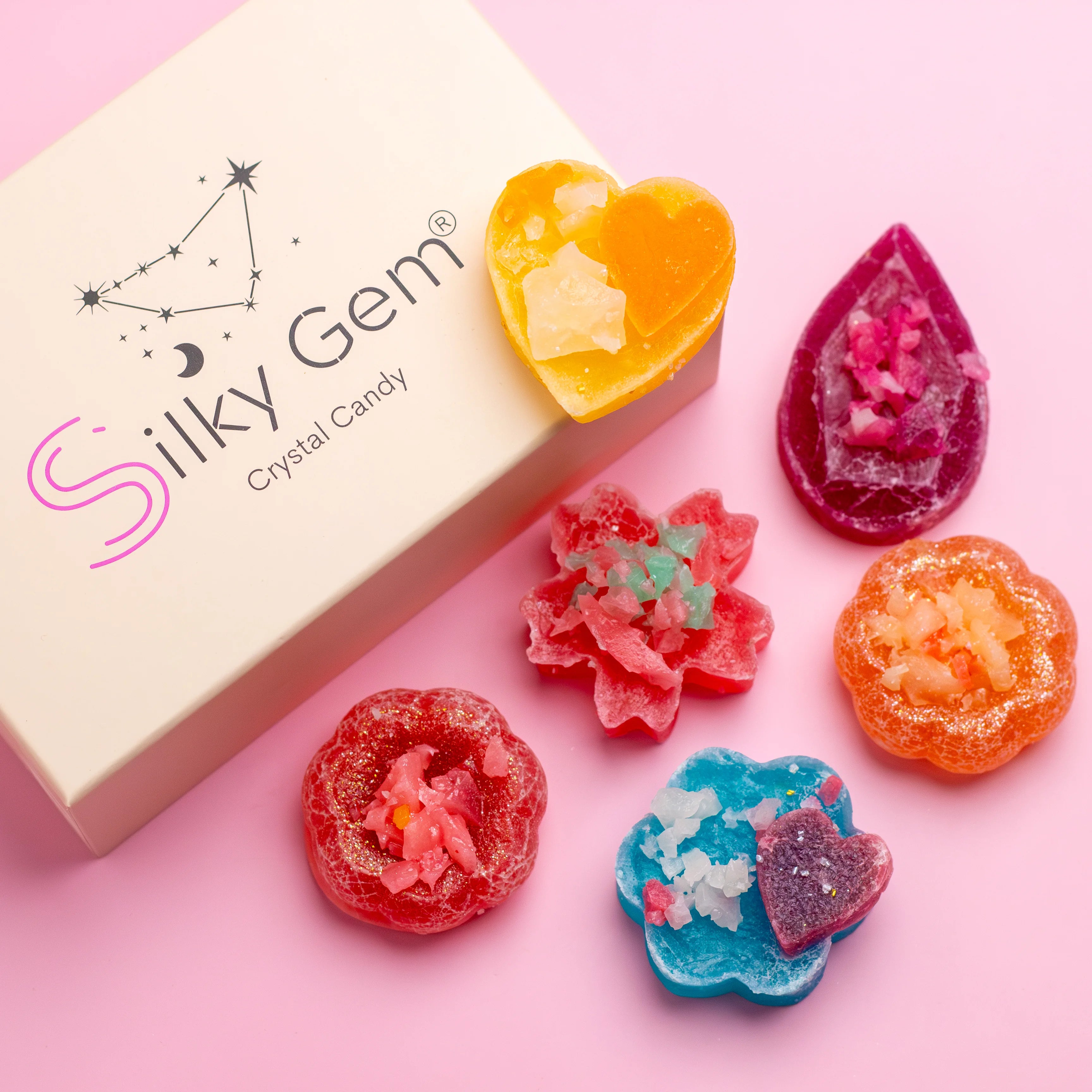 Silky Gem crystal candy on a pink background