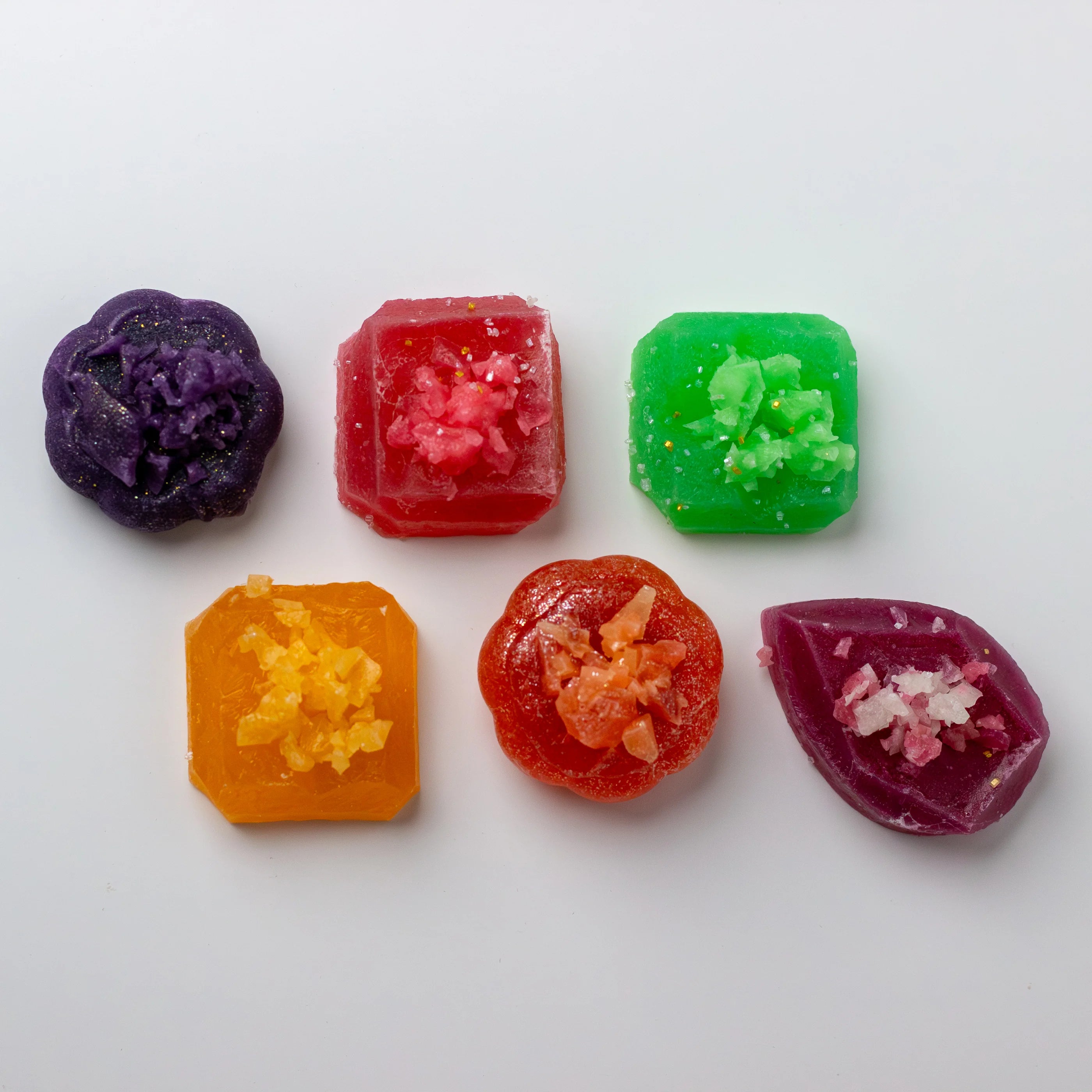 Colorful gummy candies on a white background