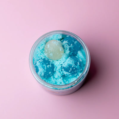 Morgan's Sour Spheres crystal candy in a jar on a pink background