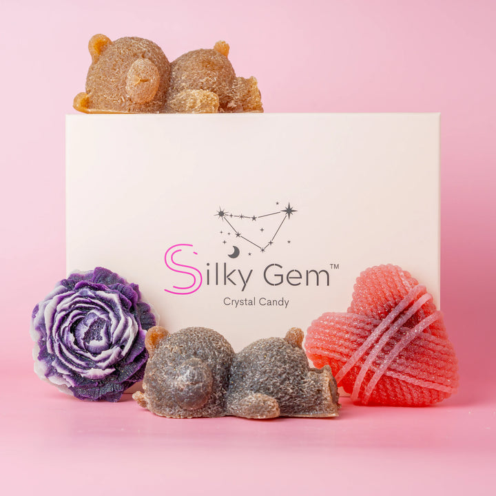 Silky Gem box with a collection of crystal candies. Purple peony, sleeping bears, and heart.