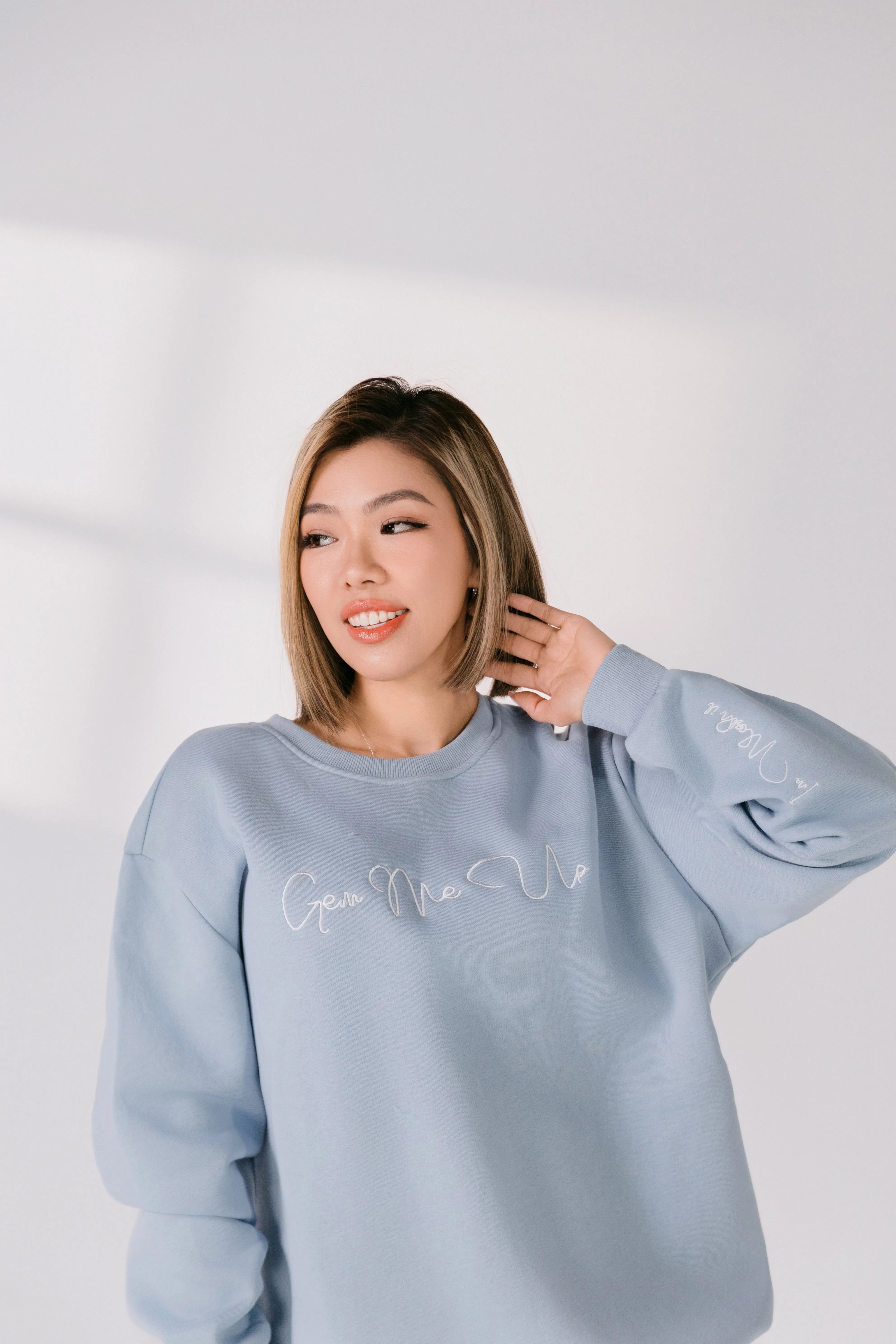 Detail of ribbed neckline and soft brushed interior fabric.