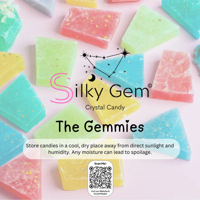 Close-up of the Silky Gem® Gemmies Collection display graphic with the brand logo, 'The Gemmies' title, and a scannable QR code on a pink background.