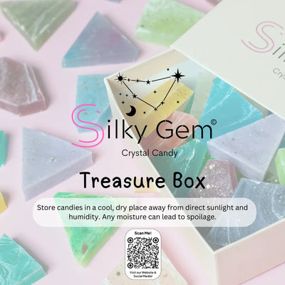 Close-up of the Silky Gem® Treasure Box collection display graphic featuring the brand logo, 'Treasure Box' title, and a scannable QR code on a pink background